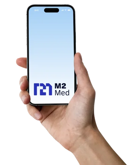 The M2Med app on an iPhone, held in a hand